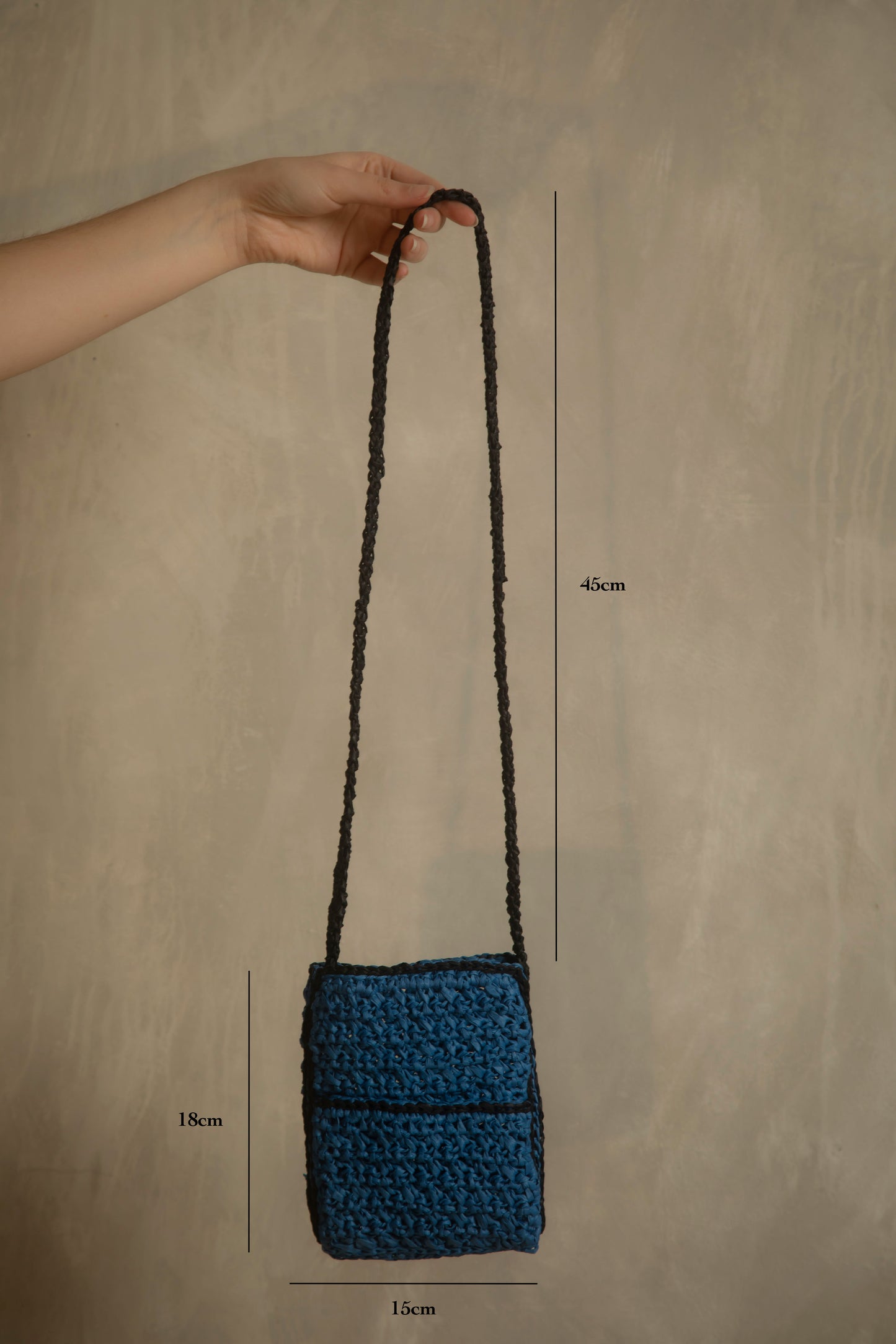 Blue and black crochet bag