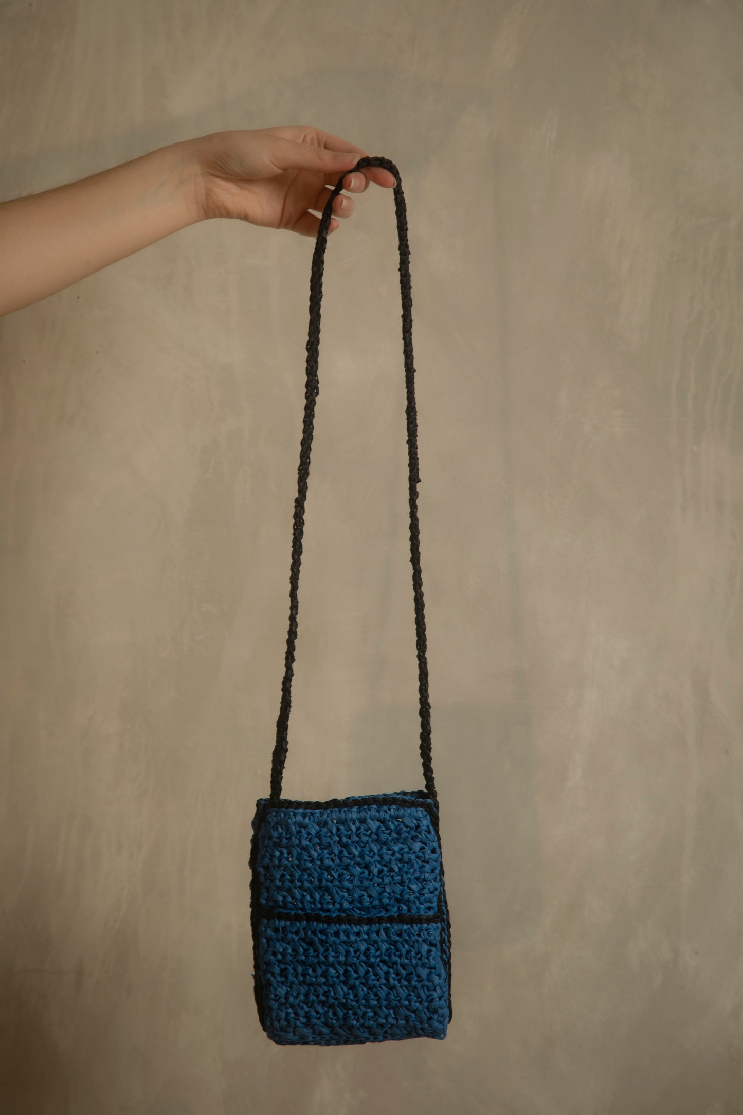 Blue and black crochet bag