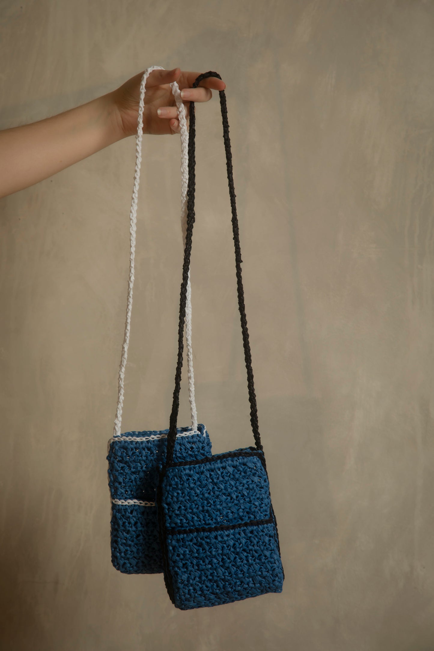 Blue and black crochet bag