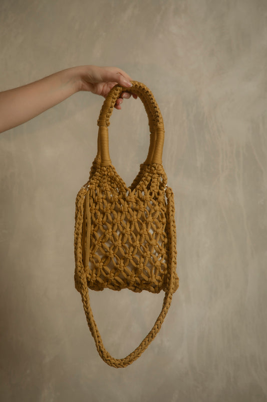 Golden crochet bag