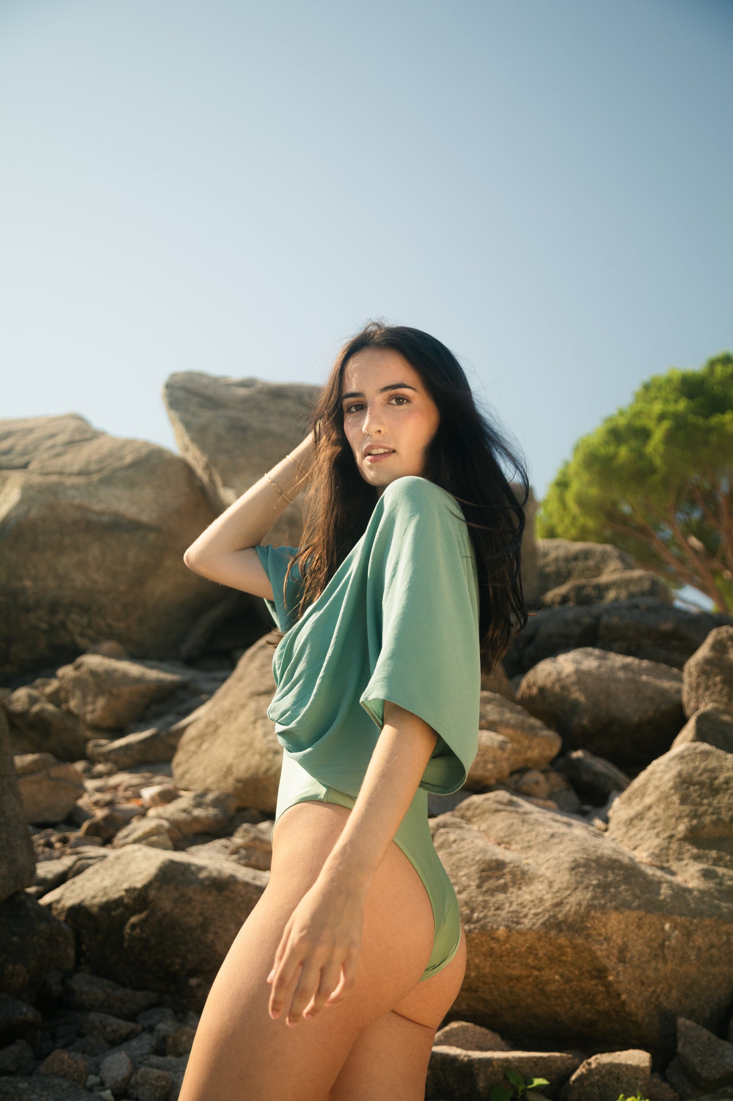 Light green swimsuit with sleeves, onepiece